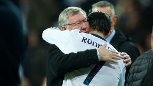 MADRID, SPAIN - FEBRUARY 13: Cristiano Ronaldo (R) of Real Madrid embraces Sir Alex Ferguson, manager of Manchester United, at the end of the UEFA Champions League Round of 16 first leg match between Real Madrid and Manchester United at Estadio Santiago Bernabeu on February 13, 2013 in Madrid, Spain. (Photo by Jasper Juinen/Getty Images)